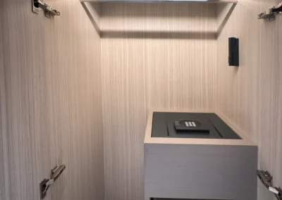 In-room closet with digital safe and drawers at Courtyard Taipei Downtown.