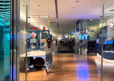 Entrance to the FIT gym at W Taipei, featuring a modern design with bright lighting and sleek interiors.