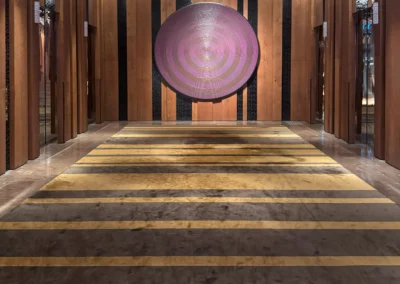 Lower lobby elevator waiting area.