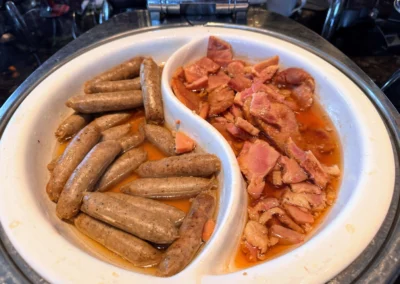 Sausages and maple ham at the breakfast buffet in YEN restaurant, W Taipei.