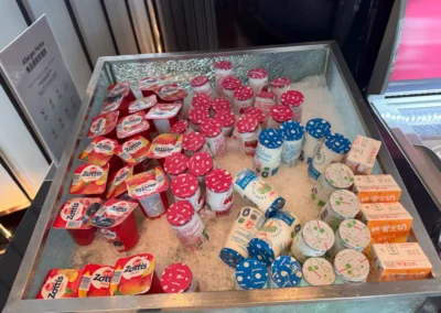 Selection of yogurt cups and probiotic drinks on ice at YEN restaurant in W Taipei's breakfast buffet.