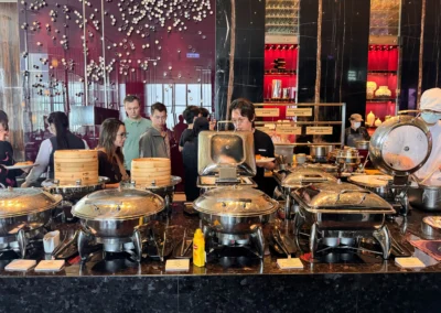 Guests selecting food from the breakfast buffet at YEN restaurant